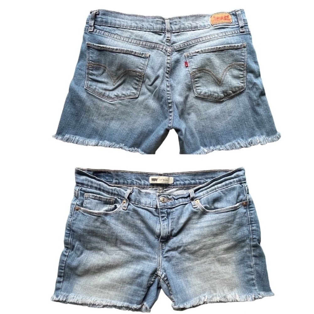 Levi’s Blue distressed raw hem cut-off blue jean shorts, broke in